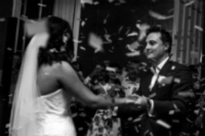 Bride and groom with confetti